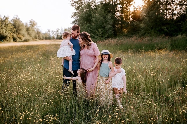 Champagne Taste and Beer Can Budget: Savannah Walsh’s Top 5 Baby Essentials, Savannah Walsh and her family in a field.